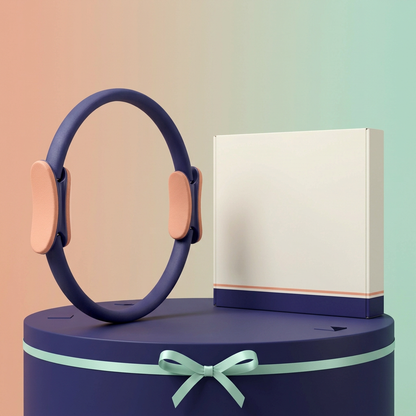 Indigo and peach Pilates ring with blank ivory carton on an indigo display podium